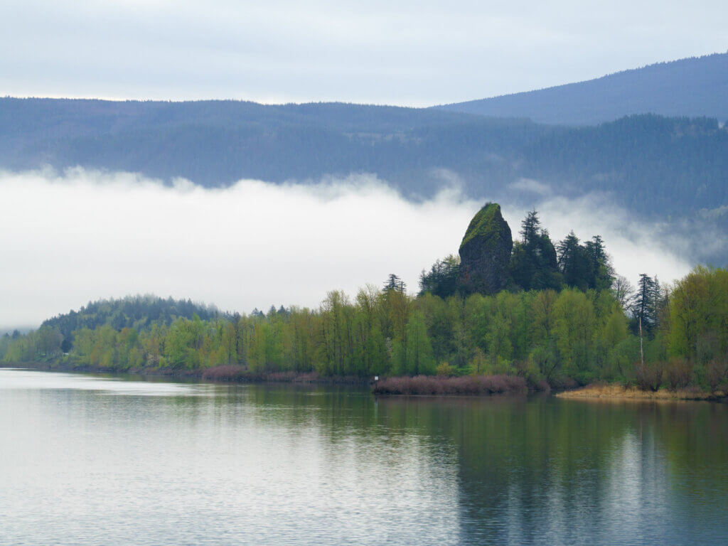 Rooster Rock rises above the Columbia River.